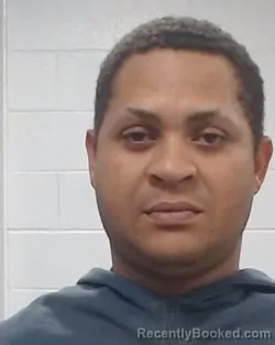 Mugshot of Adam Elangwa