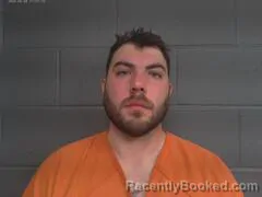 Mugshot of JUSTIN TAD MOORE