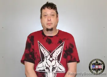 Mugshot of DUSTIN THOMPSON