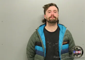 Mugshot of SCHUYLER HOUFEK