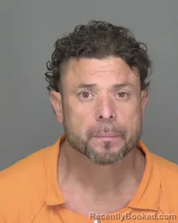 Mugshot of MATTHEW JACOB CRUCES