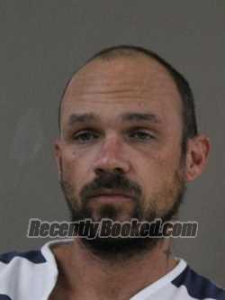 Booking photo from Denton County, Texas