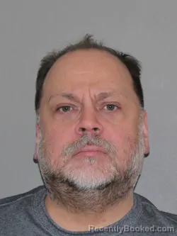 Mugshot of Adam J Evans