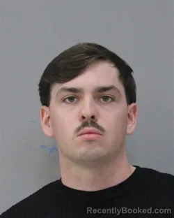 Mugshot of MYLES MOGAN