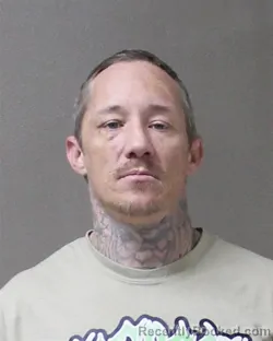 Mugshot of HENRY EMMETT HARRUP