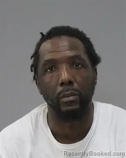 Mugshot of TREVOR EVINS