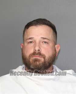 Booking photo from Ellis County, Texas