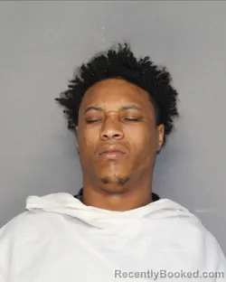 Mugshot of JUSTIN MICHAEL SYLVAN