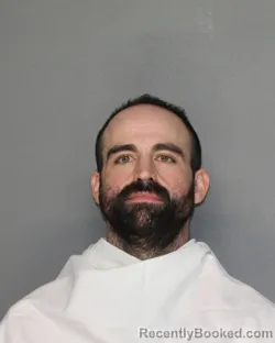 Mugshot of MATTHEW CAREY WOODS