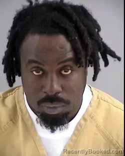 Mugshot of MARTIN MAWOLOYAN AKOI