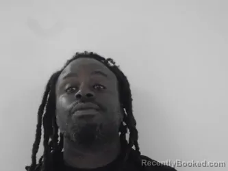 Mugshot of MARTIN MAWOLOYAN AKOI