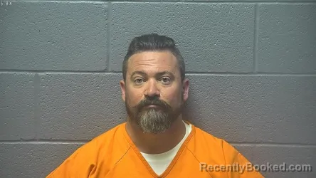 Mugshot of MATTHEW DWAYNE COOKUS