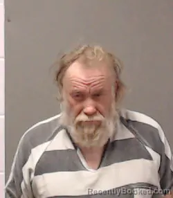 Mugshot of Joe Bill Romans