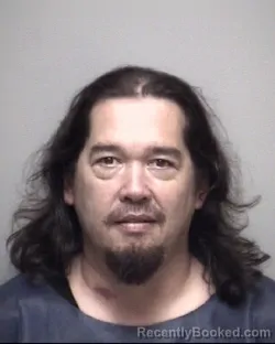 Mugshot of ADAM . TONG