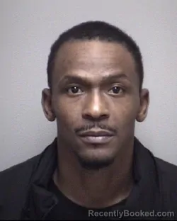 Mugshot of TRAVIAN JAMAL REED