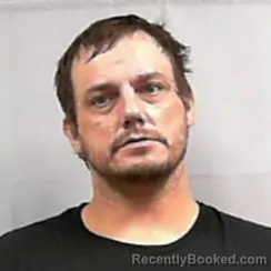Mugshot of Justin Daniel Cook