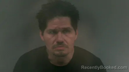 Mugshot of Christopher Brewster