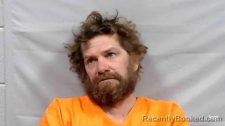 Mugshot of Travis Jonathon Menke