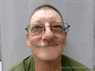 Mugshot of Clarence Edward Huffman