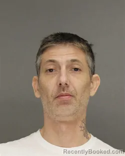 Mugshot of JUSTYN DAVID HETRICK