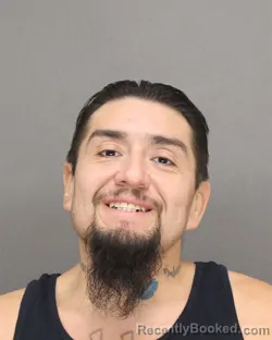 Mugshot of ADAN NMI ROBLEDO