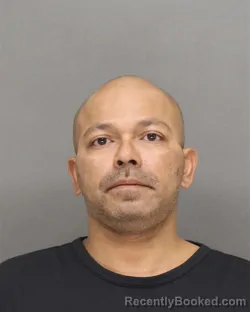 Mugshot of JOHN NMI TEK