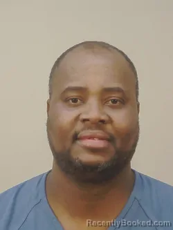 Mugshot of ARSENE KAMEGNAN SEA KELA