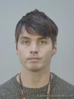 Mugshot of LOGAN MICHEL JENSEN