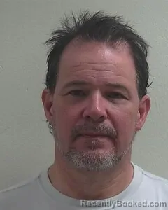 Mugshot of DAVID A TOLLAS