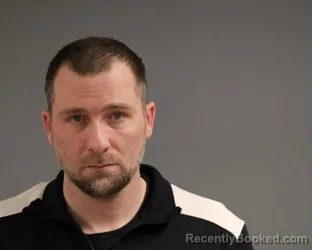 Mugshot of JUSTIN JAMES CHRISTIANSEN