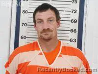 Mugshot of TRAVIS MACOY KUHL