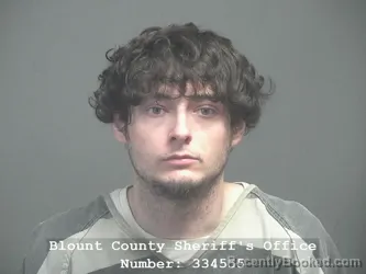 Mugshot of TREVOR ALEX ENSMINGER