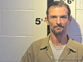 Mugshot of JONATHAN A SWEAT