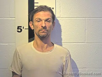 Mugshot of JONATHAN A SWEAT