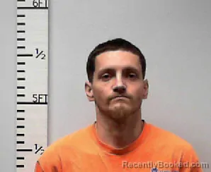 Mugshot of Austin Bradley Sims