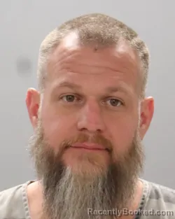 Mugshot of RAYMOND WELLINGTON TROUTMAN