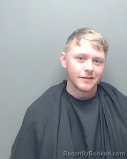 Mugshot of TRAVIS GENE DOWNEY