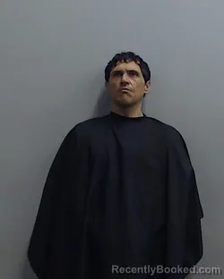 Mugshot of TRAVIS WAYNE THOMAS