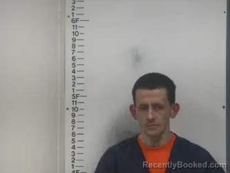 Mugshot of JUSTIN B ASAD