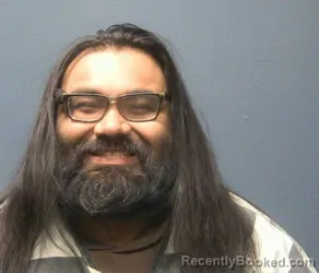 Mugshot of CARLOS THOMAS KRAGH