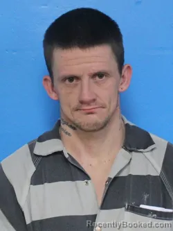 Mugshot of JUSTIN MARTIN ROBERTS