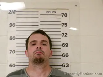 Mugshot of JUSTIN GLENN ADRIO