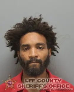 Mugshot of TROY JR LASTER