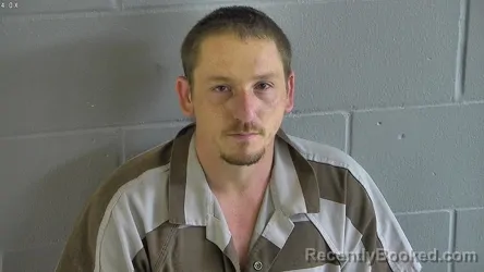 Mugshot of JUSTIN ALLEN AUSBURN