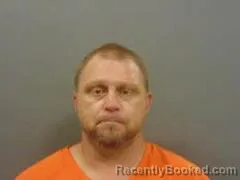 Mugshot of MARK DELONG