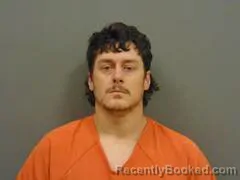 Mugshot of TRAVIS SLUSHER