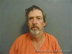 Mugshot of ELMER MCIRVIN