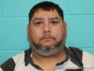 Mugshot of ARMONDO EZEKIEL OLGUIN