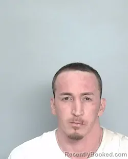 Mugshot of MICHAEL A ALCOCER