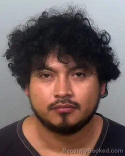 Mugshot of MAGGUIVER JHOAN ROBLERO LOPEZ